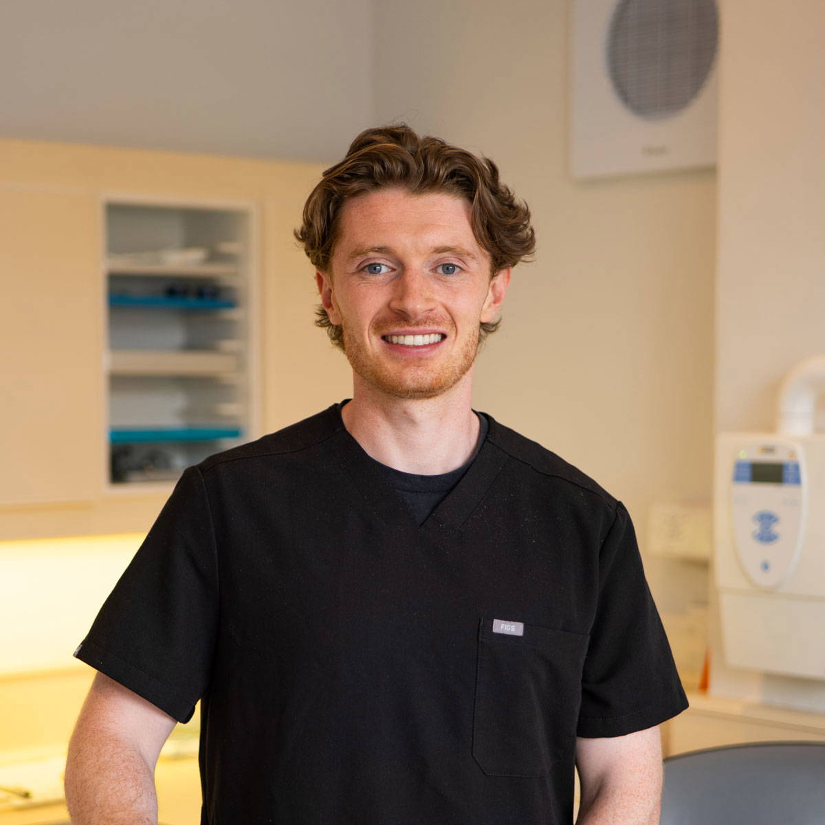 a smiling Specialist Orthodontics dentist for Children, Teenagers & Adults in Wilmslow